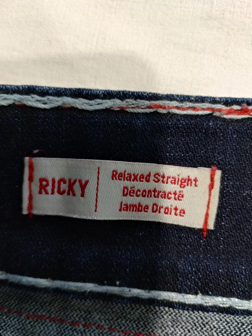 True Religion Dark Blue Denim Cutoff Shorts with Contrast Stitching